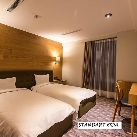 อะบันท์ โลตัส โอเทล Hotel โบลู ภายนอก รูปภาพ